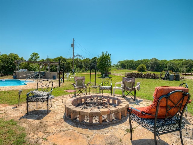 870756 S 3460th Rd, Chandler, OK 74834 - view of patio / terrace with a fire pit, an outdoor pool, and a pergola