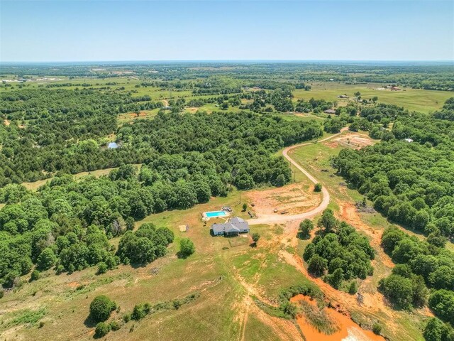 870756 S 3460th Rd, Chandler, OK 74834 - aerial view of sparsely populated area featuring a heavily wooded area