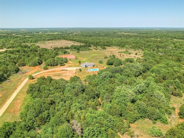 870756 S 3460th Rd, Chandler, OK 74834 - aerial view of property's location with a heavily wooded area