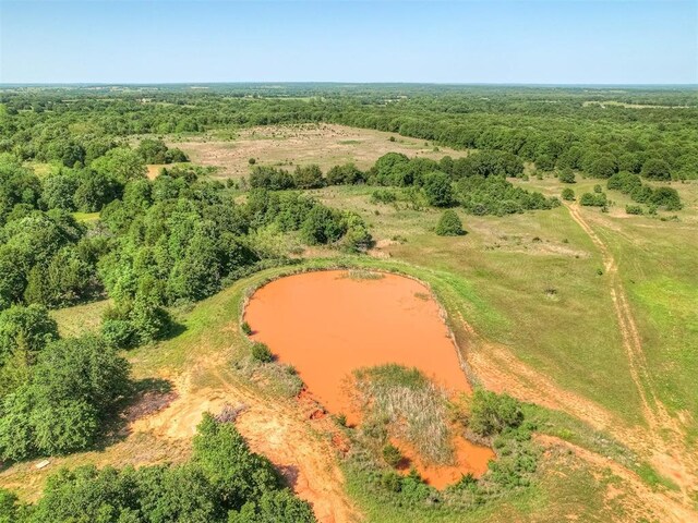 870756 S 3460th Rd, Chandler, OK 74834 - aerial view of a large body of water and a heavily wooded area