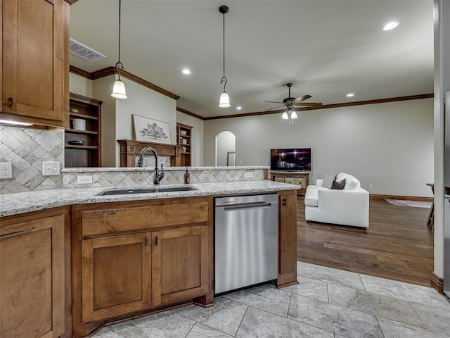 18854 Marbella Ln, Harrah, OK 73045 - kitchen with dishwasher, a sink, brown cabinetry, ornamental molding, and ceiling fan