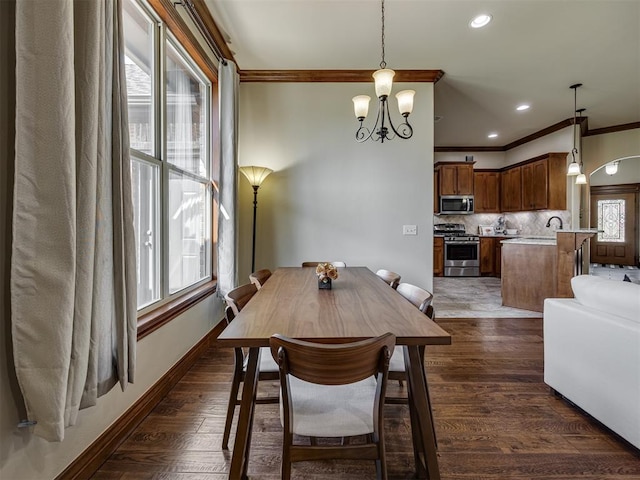18854 Marbella Ln, Harrah, OK 73045 - dining space featuring crown molding, a chandelier, dark wood-style floors, recessed lighting, and baseboards