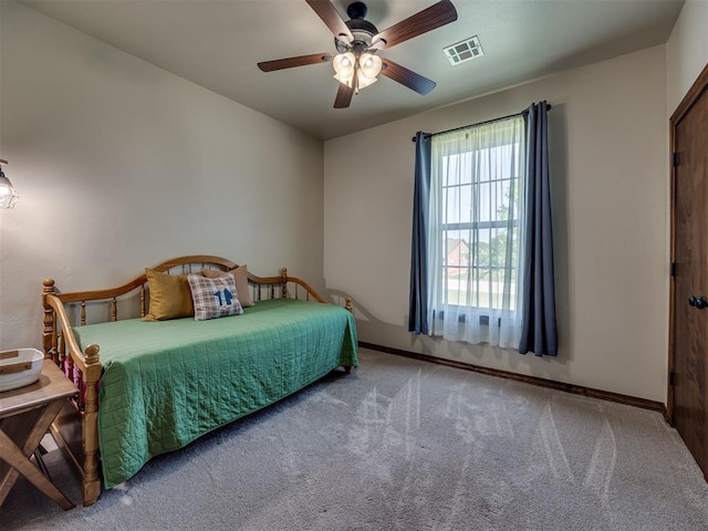 18854 Marbella Ln, Harrah, OK 73045 - carpeted bedroom featuring baseboards and a ceiling fan