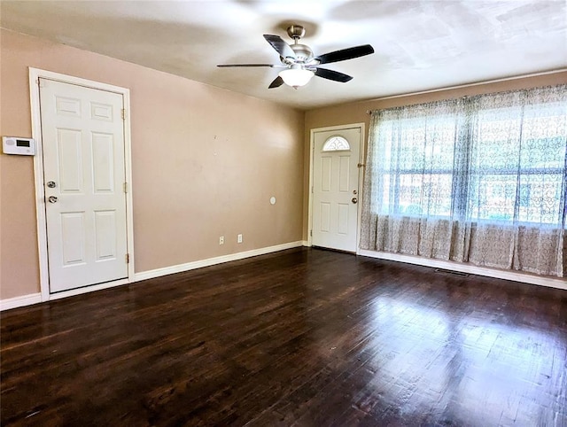 264 E Coe Dr, Midwest City, OK 73110 - entryway featuring a ceiling fan, wood finished floors, and baseboards