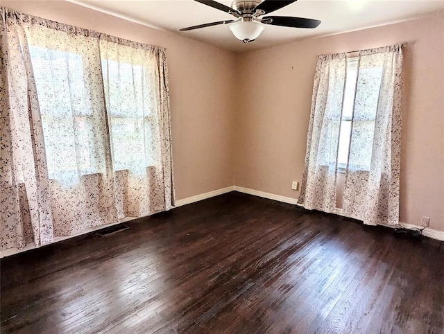 264 E Coe Dr, Midwest City, OK 73110 - unfurnished room featuring wood finished floors, ceiling fan, and baseboards