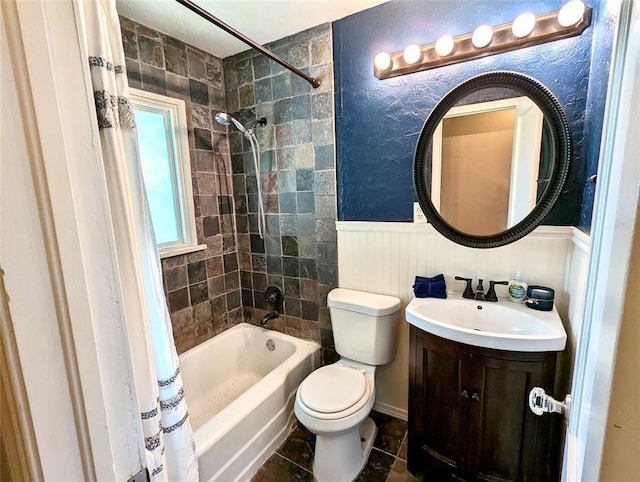 264 E Coe Dr, Midwest City, OK 73110 - bathroom with shower / bath combo, toilet, vanity, and wainscoting