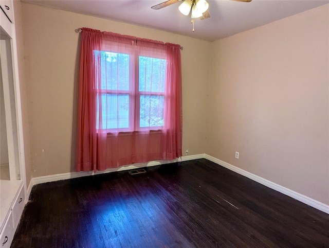 264 E Coe Dr, Midwest City, OK 73110 - spare room with wood finished floors, a ceiling fan, and baseboards