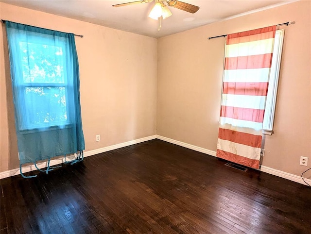 264 E Coe Dr, Midwest City, OK 73110 - empty room with wood-type flooring, a ceiling fan, and baseboards