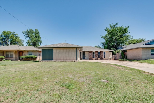 1309 NW 106th St, Oklahoma City, OK 73114 - ranch-style house featuring brick siding and concrete driveway
