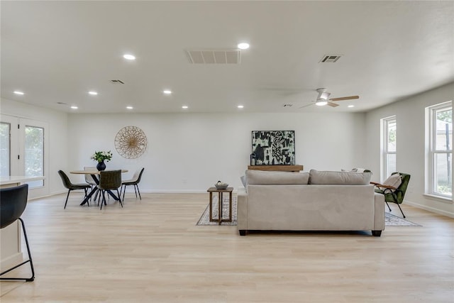 1309 NW 106th St, Oklahoma City, OK 73114 - living area with light wood-style floors, baseboards, ceiling fan, and recessed lighting