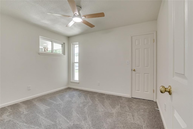 1309 NW 106th St, Oklahoma City, OK 73114 - carpeted spare room featuring a ceiling fan, baseboards, and a textured ceiling