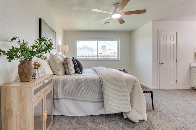 1309 NW 106th St, Oklahoma City, OK 73114 - bedroom with light colored carpet, ceiling fan, and baseboards