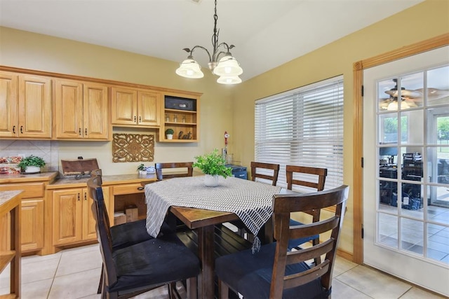 605 S Timber Ridge Dr, Cushing, OK 74023 - dining space featuring light tile patterned flooring and a chandelier