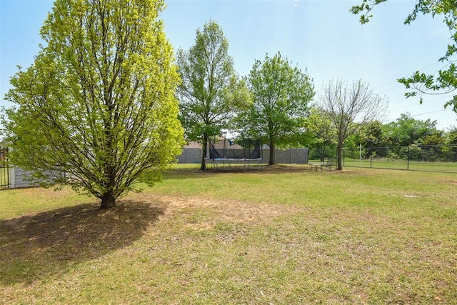 605 S Timber Ridge Dr, Cushing, OK 74023 - view of yard with a trampoline