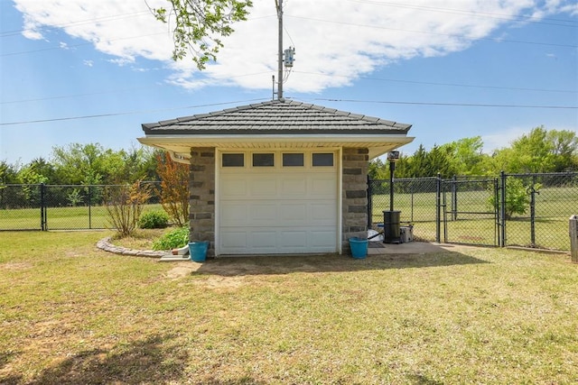 605 S Timber Ridge Dr, Cushing, OK 74023 - detached garage with a gate and driveway