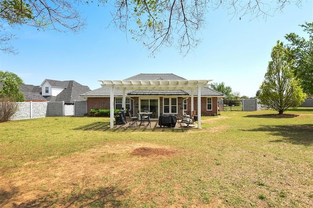 605 S Timber Ridge Dr, Cushing, OK 74023 - back of property with a pergola, a patio area, and brick siding