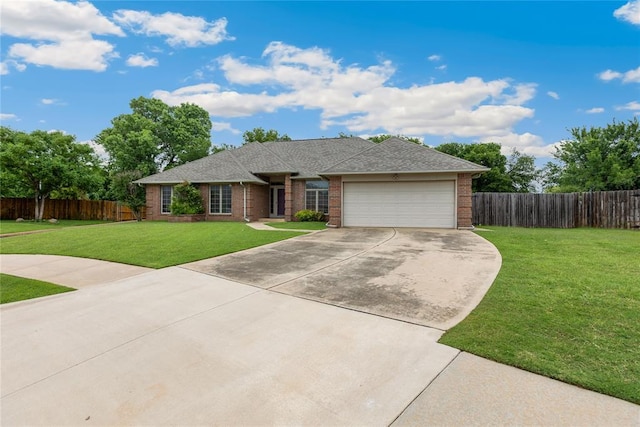 11800 Talver Ln, Oklahoma City, OK 73170 - single story home featuring concrete driveway, brick siding, an attached garage, and roof with shingles
