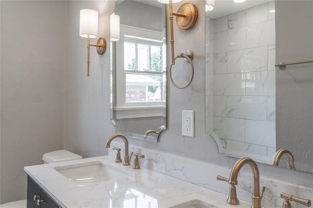 2301 N Kelham Ave, Oklahoma City, OK 73111 - full bathroom featuring double vanity and toilet