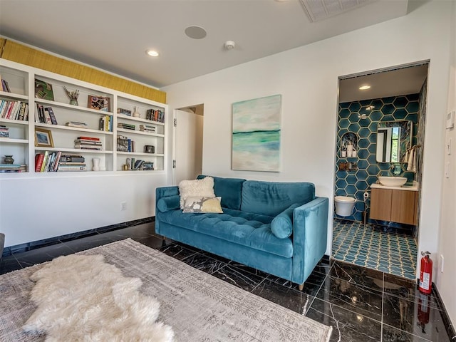 11300 N Westminster Rd, Jones, OK 73049 - living area with baseboards, marble finish floors, and recessed lighting