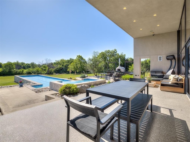 11300 N Westminster Rd, Jones, OK 73049 - view of patio / terrace featuring outdoor lounge area, an infinity pool, view of wooded area, and outdoor dining area