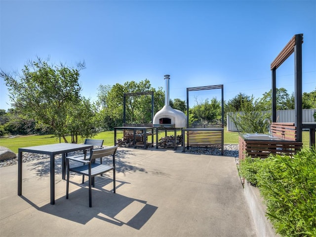 11300 N Westminster Rd, Jones, OK 73049 - view of community with a patio area and outdoor dining space