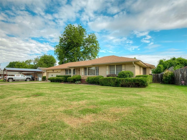 513 SW 57th St, Oklahoma City, OK 73109 - ranch-style home featuring a garage and brick siding