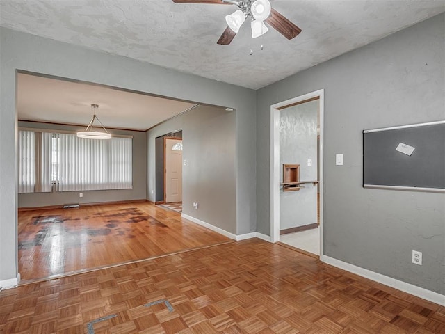 513 SW 57th St, Oklahoma City, OK 73109 - unfurnished room with baseboards and ceiling fan