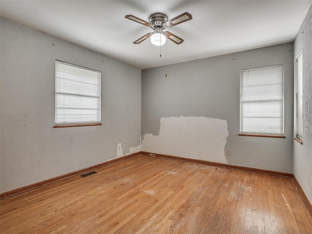 513 SW 57th St, Oklahoma City, OK 73109 - unfurnished room with ceiling fan, light wood finished floors, and baseboards