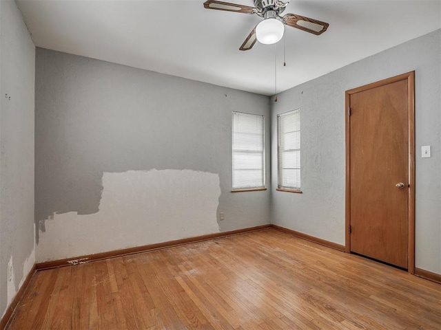 513 SW 57th St, Oklahoma City, OK 73109 - unfurnished room featuring hardwood / wood-style flooring, baseboards, and ceiling fan