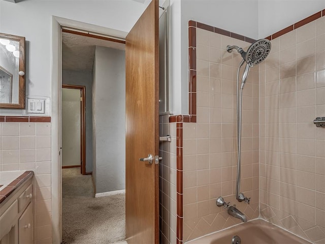 513 SW 57th St, Oklahoma City, OK 73109 - bathroom featuring tub / shower combination and vanity