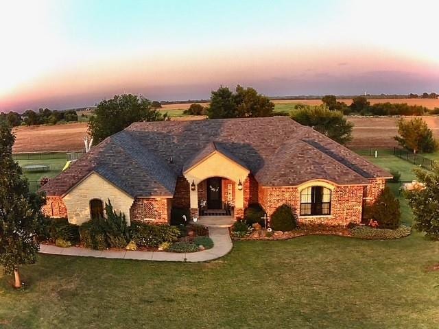 710 Isaiah Ln, Tuttle, OK 73089 - view of front of home featuring brick siding