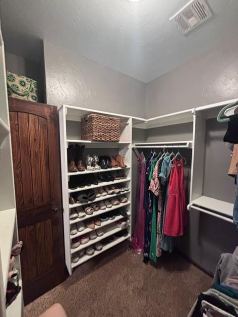 710 Isaiah Ln, Tuttle, OK 73089 - spacious closet with carpet floors