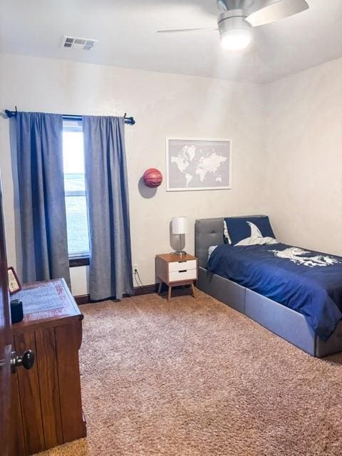 710 Isaiah Ln, Tuttle, OK 73089 - bedroom with carpet flooring and ceiling fan