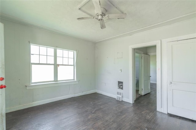 820 W Highland St, Shawnee, OK 74801 - unfurnished room with hardwood / wood-style flooring, a ceiling fan, baseboards, and heating unit