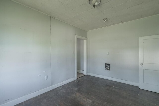 820 W Highland St, Shawnee, OK 74801 - unfurnished room featuring wood finished floors and baseboards