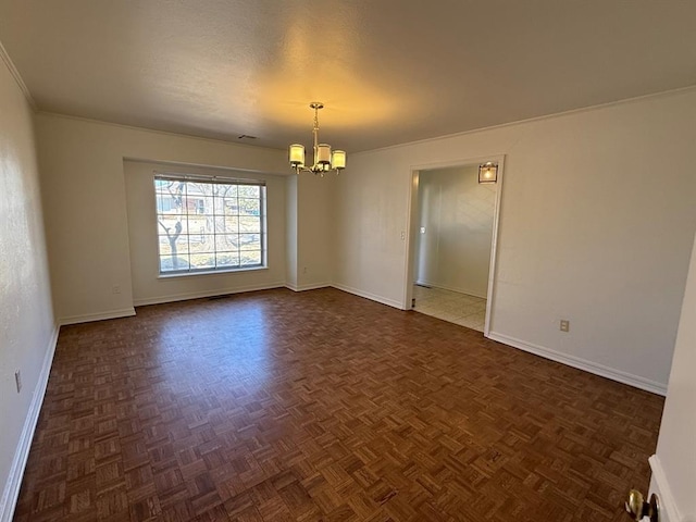 1908 NW 56th Ter, Oklahoma City, OK 73118 - empty room with a chandelier and baseboards