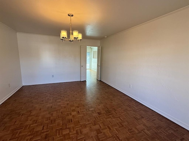 1908 NW 56th Ter, Oklahoma City, OK 73118 - empty room with a chandelier and baseboards
