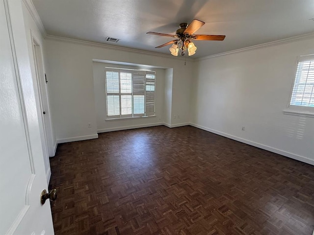1908 NW 56th Ter, Oklahoma City, OK 73118 - unfurnished room featuring baseboards, a ceiling fan, plenty of natural light, and ornamental molding
