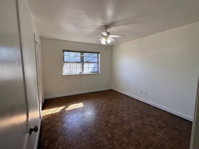 1908 NW 56th Ter, Oklahoma City, OK 73118 - empty room with a ceiling fan and baseboards
