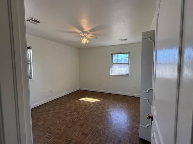 1908 NW 56th Ter, Oklahoma City, OK 73118 - unfurnished room featuring a ceiling fan and baseboards