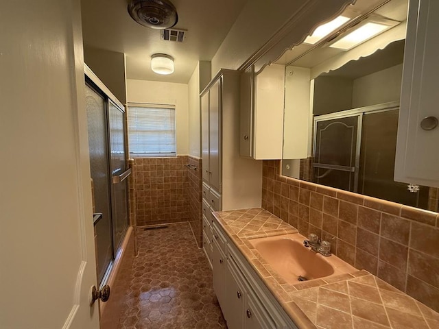 1908 NW 56th Ter, Oklahoma City, OK 73118 - full bath featuring a shower with door and vanity