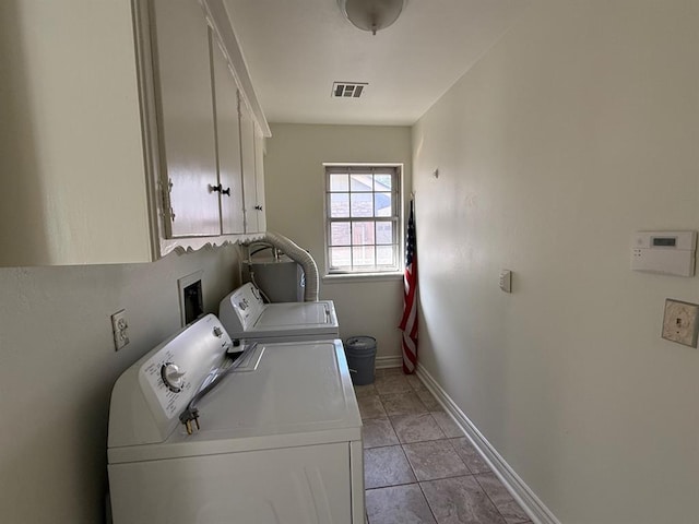 1908 NW 56th Ter, Oklahoma City, OK 73118 - washroom featuring washer and clothes dryer, cabinet space, and baseboards
