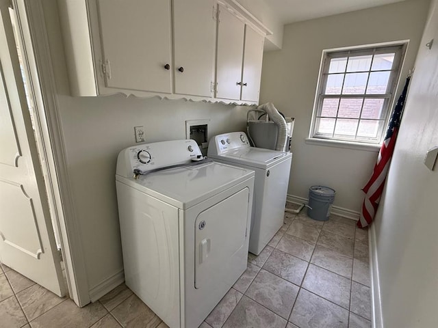 1908 NW 56th Ter, Oklahoma City, OK 73118 - laundry room with separate washer and dryer, cabinet space, and baseboards