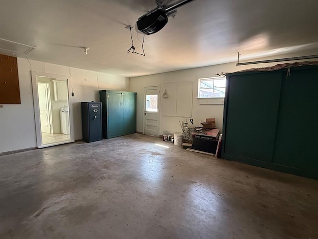 1908 NW 56th Ter, Oklahoma City, OK 73118 - garage featuring a garage door opener and electric panel