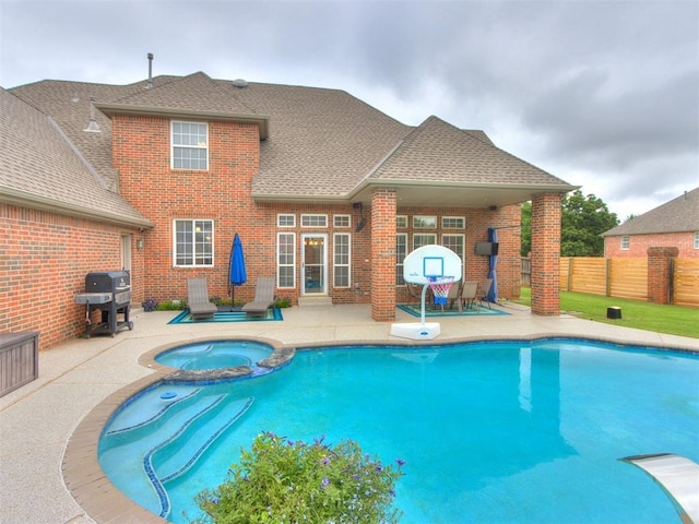 2508 Thunderwind Cir, Edmond, OK 73034 - view of pool featuring a patio, area for grilling, and a pool with connected hot tub