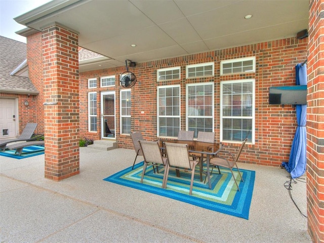 2508 Thunderwind Cir, Edmond, OK 73034 - view of patio / terrace featuring outdoor dining area