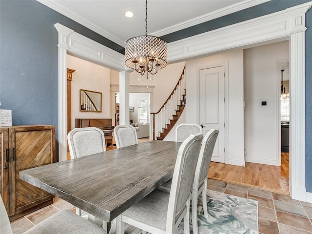 2508 Thunderwind Cir, Edmond, OK 73034 - dining room with a chandelier, stairway, ornamental molding, recessed lighting, and light tile patterned floors