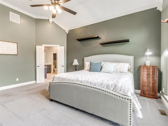 2508 Thunderwind Cir, Edmond, OK 73034 - carpeted bedroom featuring crown molding, baseboards, a ceiling fan, ensuite bath, and high vaulted ceiling