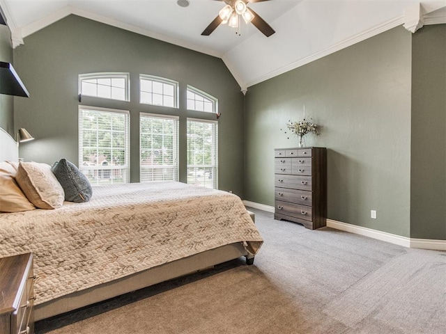 2508 Thunderwind Cir, Edmond, OK 73034 - carpeted bedroom featuring lofted ceiling, baseboards, crown molding, and a ceiling fan