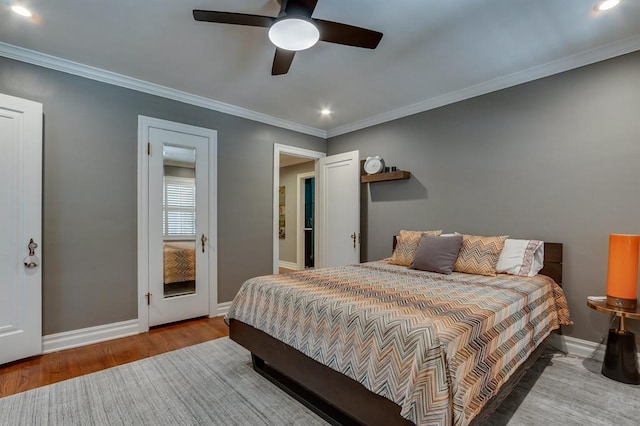 915 NW 40th St, Oklahoma City, OK 73118 - bedroom featuring wood finished floors, baseboards, ornamental molding, recessed lighting, and ceiling fan